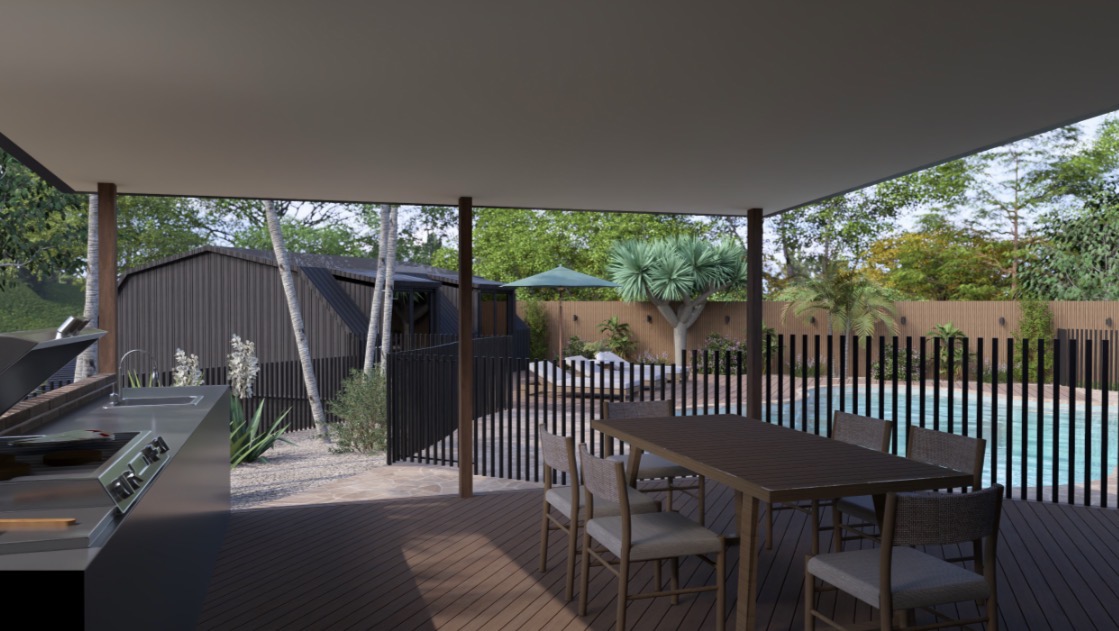 Covered alfresco — outdoor kitchen, dining area, pool views and tropical garden.